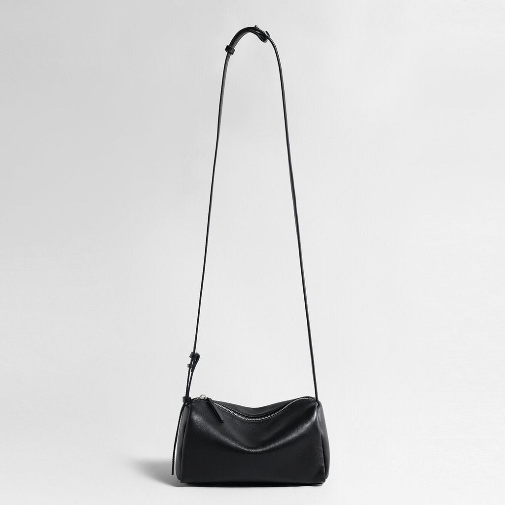 Soft Lambskin Leather Barrel Shoulder Bag – Curved-Zip Cylinder Design with Adjustable Crossbody Strap